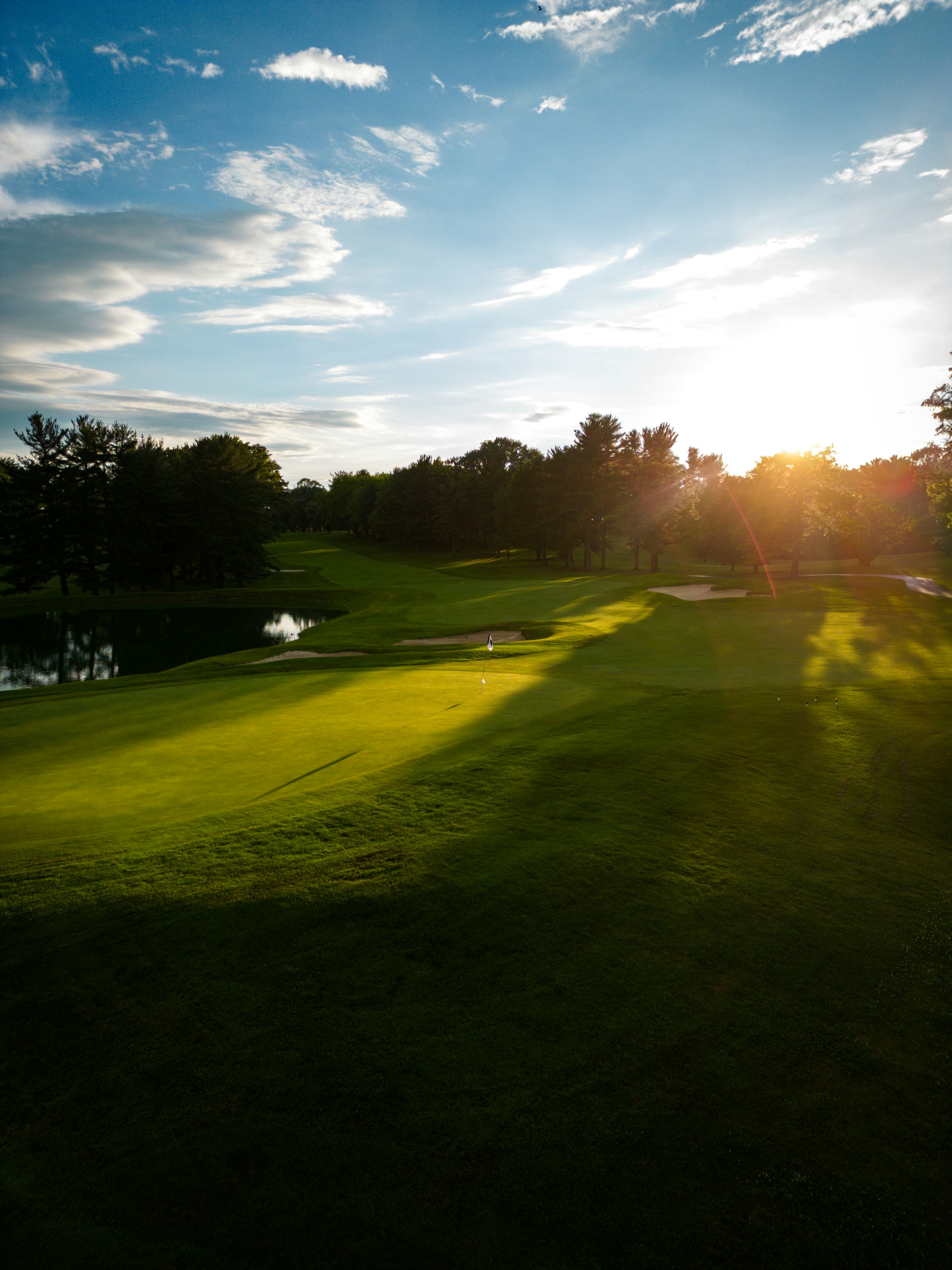 Late sun across a fairway and green